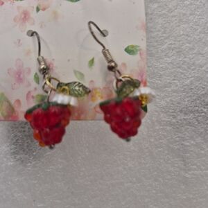 Playful Red Berry Drop Earrings with Green Leaf Accents